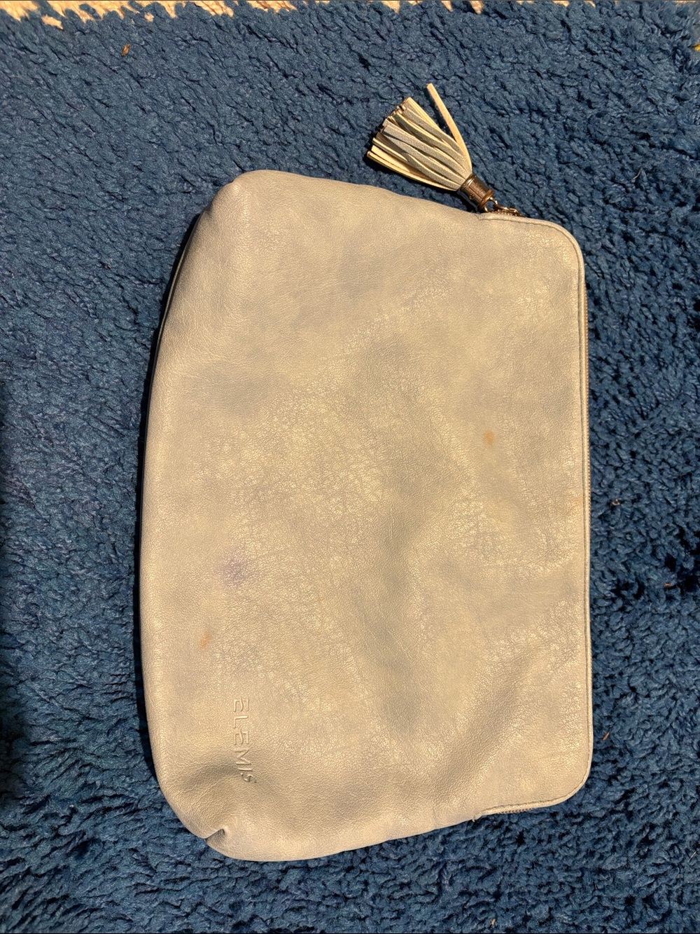 ELEMIS Cream Leather Tassel Zip Wristlet Clutch